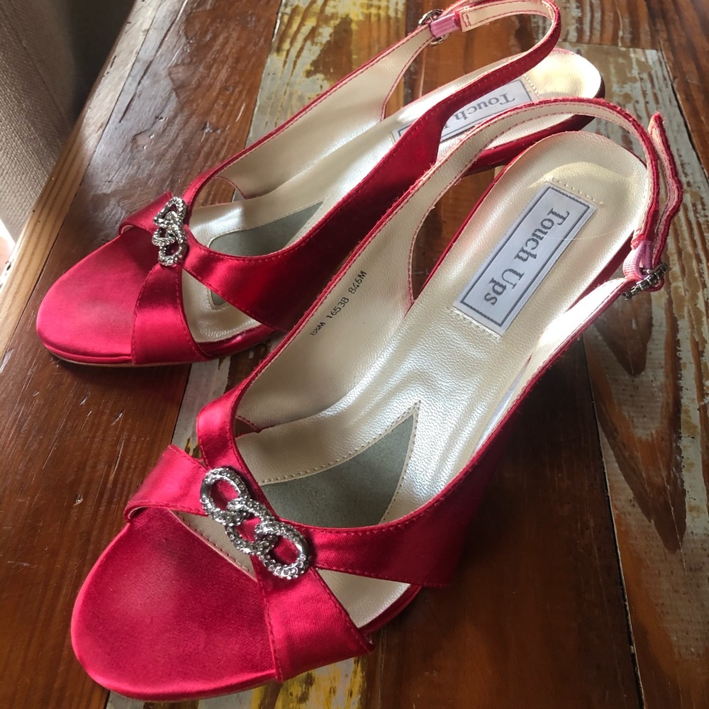 Red satin open toe shoes